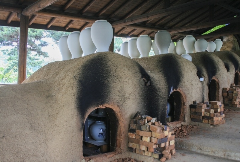 The kiln is always busy, and as you can see the next batch of vases are stacked up on top until the kiln is emptied.