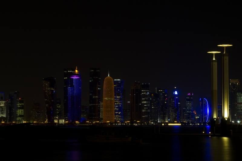 The night skyline of Doha's business district.