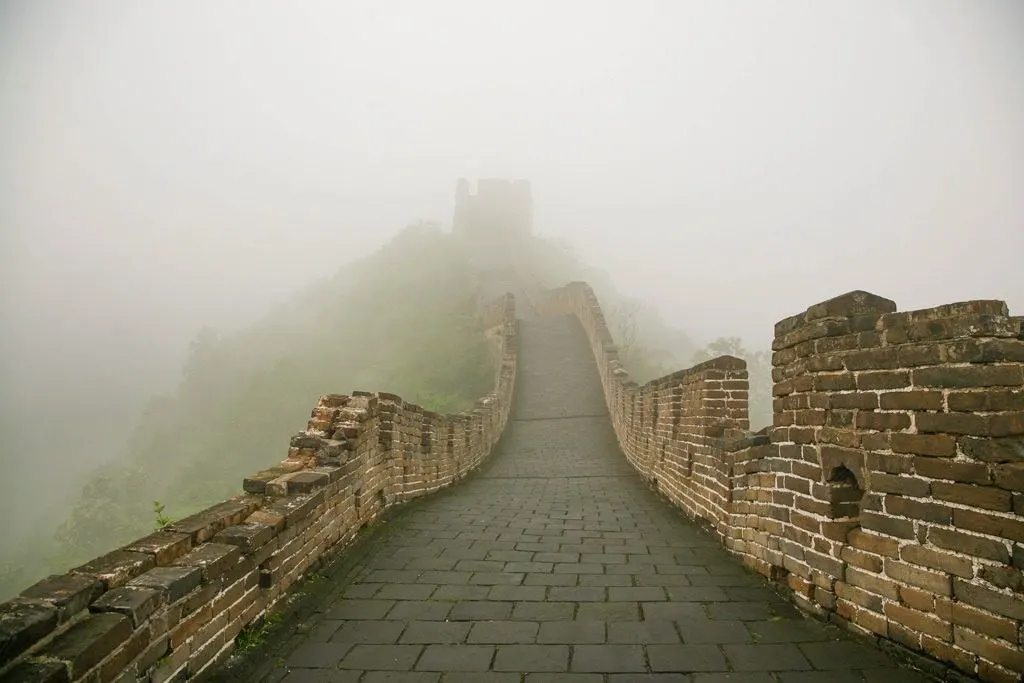 In Winter, the Great Wall of China is cold and foggy.
