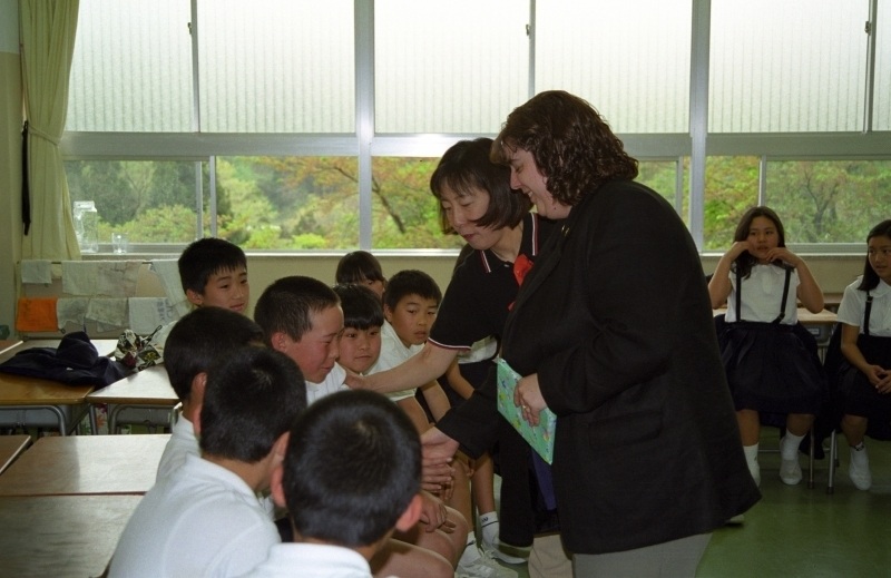 My Rotary exchange to Japan, pictured with a teacher and students.