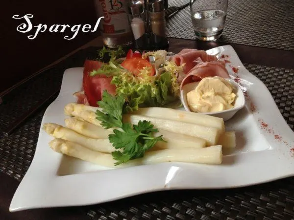 Spargel, served with ham and mayonnaise and a small salad. Yum! 