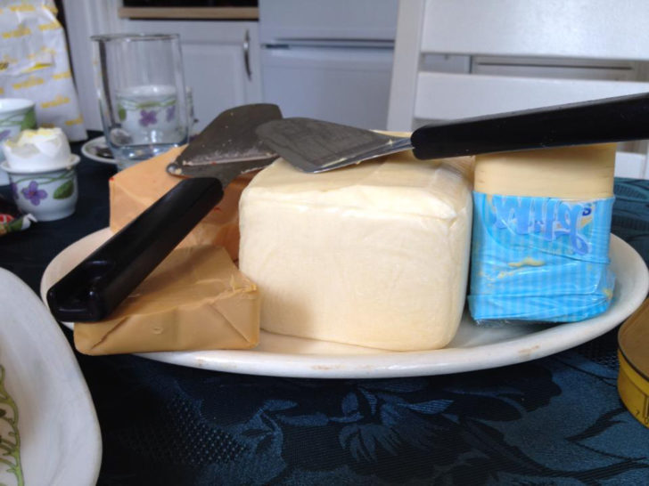 Norwegian breakfast usually contains a lot of traditional brown cheese.