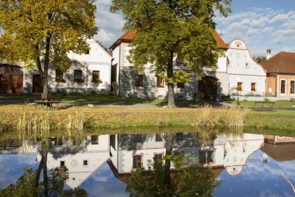 Stunning Baroque farmhouse with reflections in Holašovice.