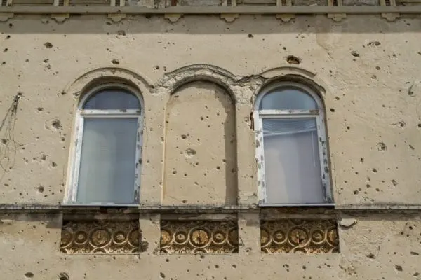 Bullet riddle walls in Bosnia.