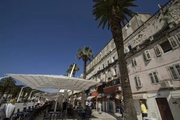 Outdoor cafes along the harbor in Split.