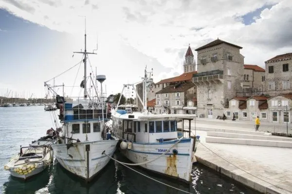 Fishing boats tied to the quay in Trogir, Croatia.