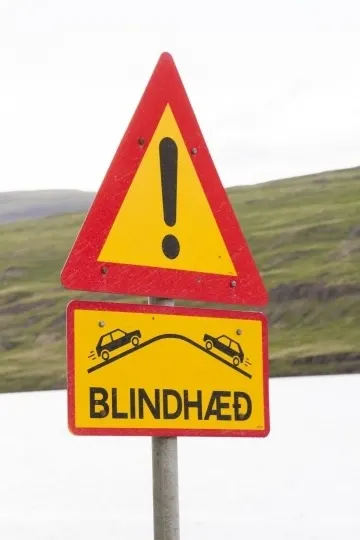 Blind hill sign found driving in Iceland.