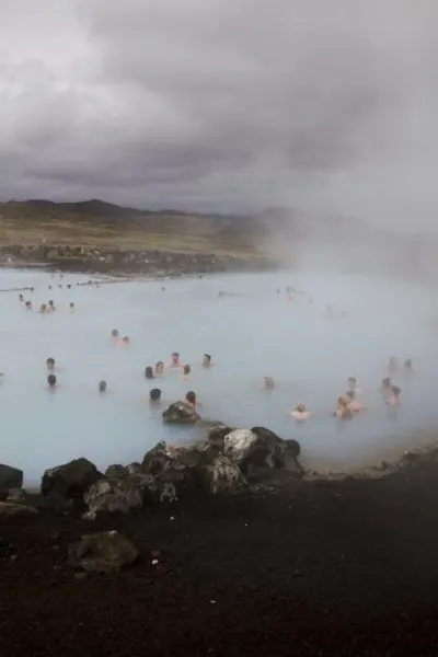 Bathers enjoy the soothing water and invigorating silica at the Blue Lagoon.