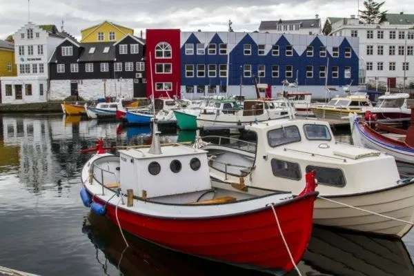 Colorful fishing boats in Torshavn harbor.