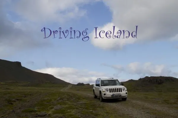 The jeep tackles a narrow dirt track in Iceland.
