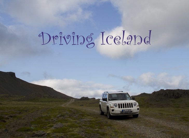 The jeep tackles a narrow dirt track driving in Iceland.