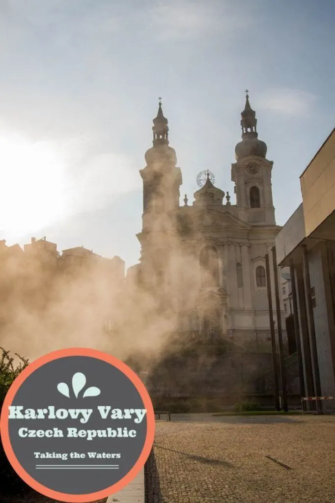 Clouds of steam from the hot springs in front of the St Mary Magdalene's Church in Karlovy Vary.