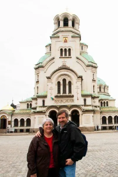 Corinne and Jim standing in front of a church in Sofia, Bulgaria. 