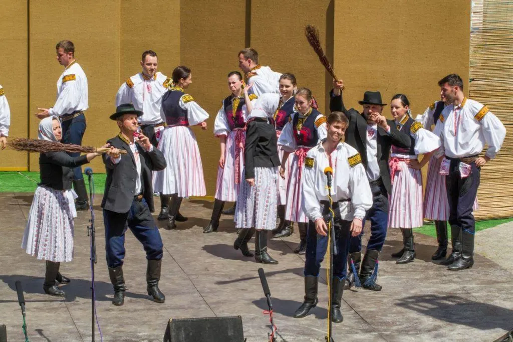 Czech folk dancers on the stage during the Ride of the Kings  in Czechia.