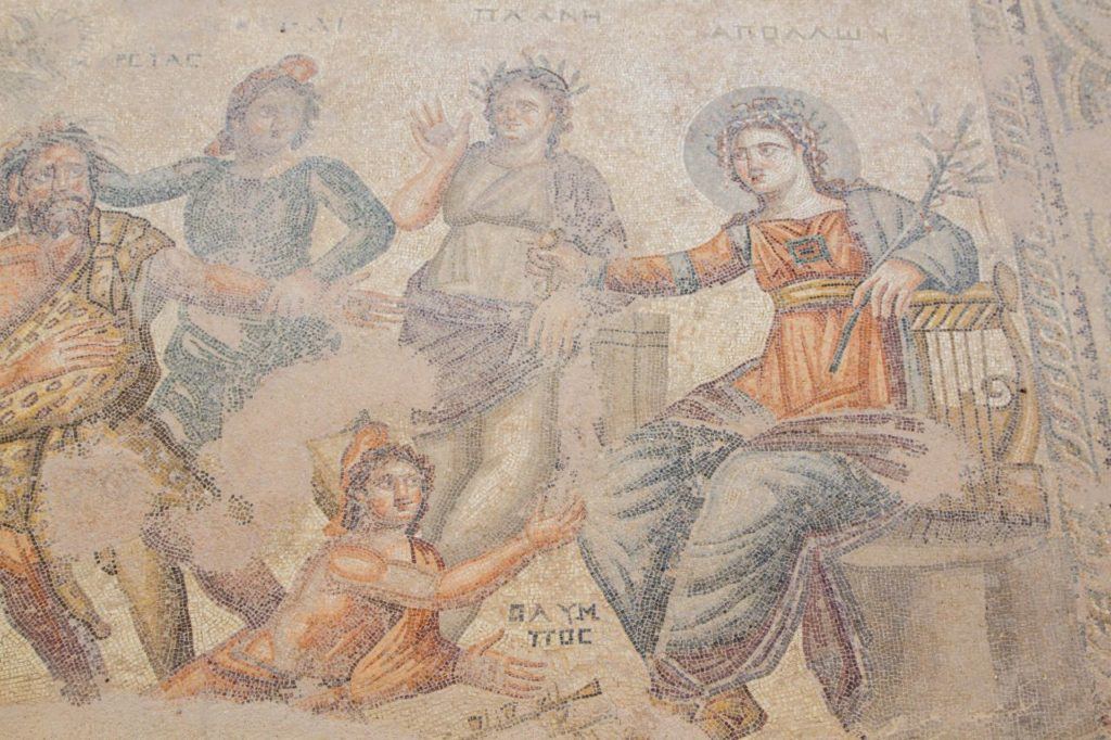 Ancient Greek mosaic showing boy pleading for fathers life.