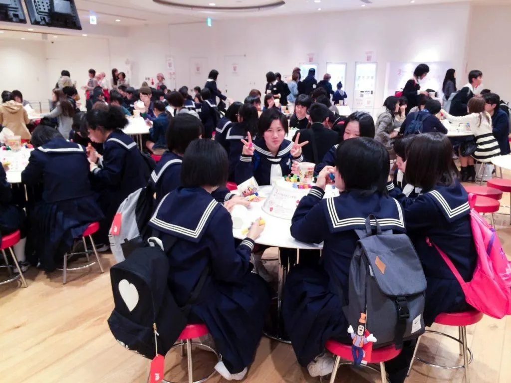 School children designing cups at the Cup Noodle Factory