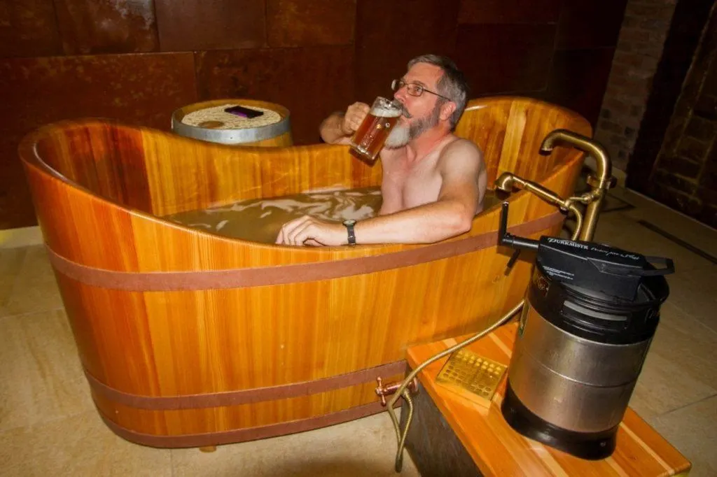 Jim drinking a pils in the beer bath.