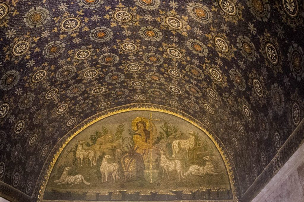 Richly decorated mosaic of stars on the ceiling of the mausoleum.