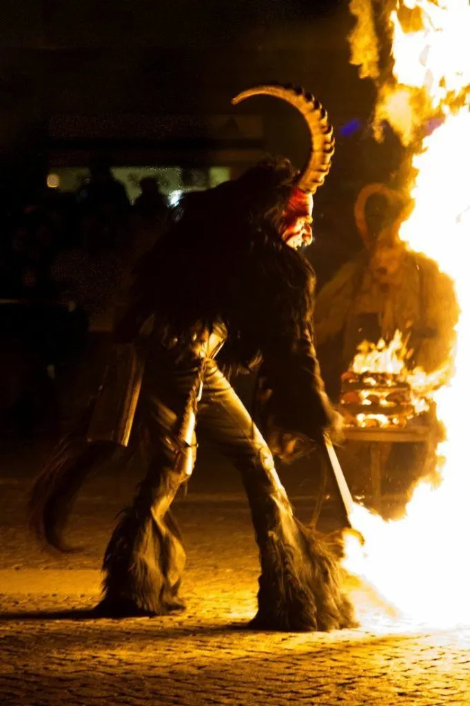 Krampus playing with fire.