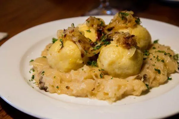 ZACH Restaurant specialty - meat filled dumplings and sauerkraut.