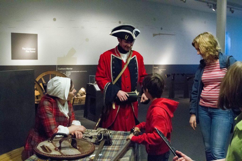 Interactive weapons display for children at Culloden Battlefield, Scotland.