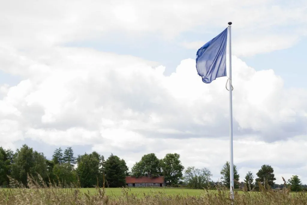 Blue flag flying over the Battlefield of Culloden Scotland.