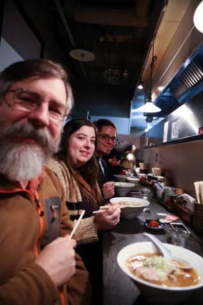 Jim, Erika, Michael eating ramen, one of the most popular Japanese foods for sure.