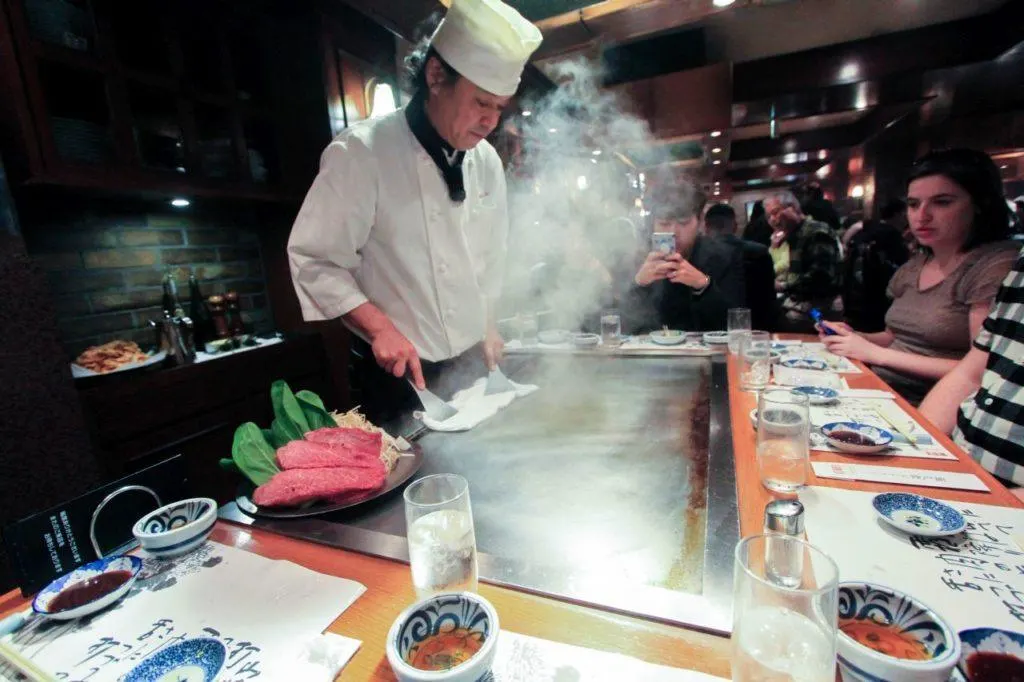 Kobe beef being cooked by a chef