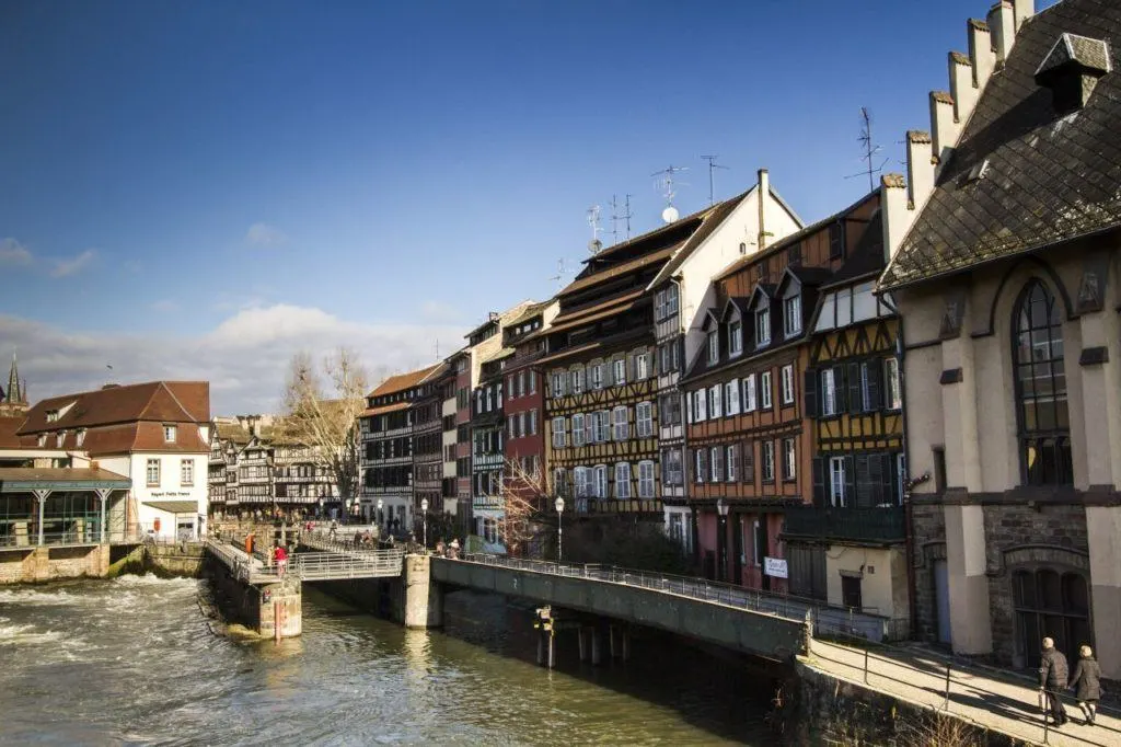 Half-timbered houses on the riverside in the quaint city of Strasbourg.