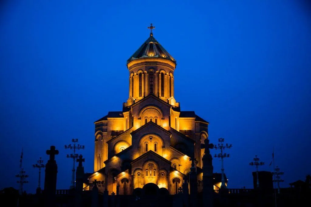 Tbilisi Holy Trinity Cathedral glowing in the evening light.