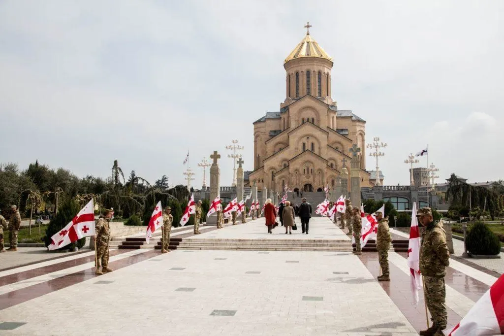 Georgian soldiers honor fallen comrades during memorial ceremony at Holy Trinity Cathedral.