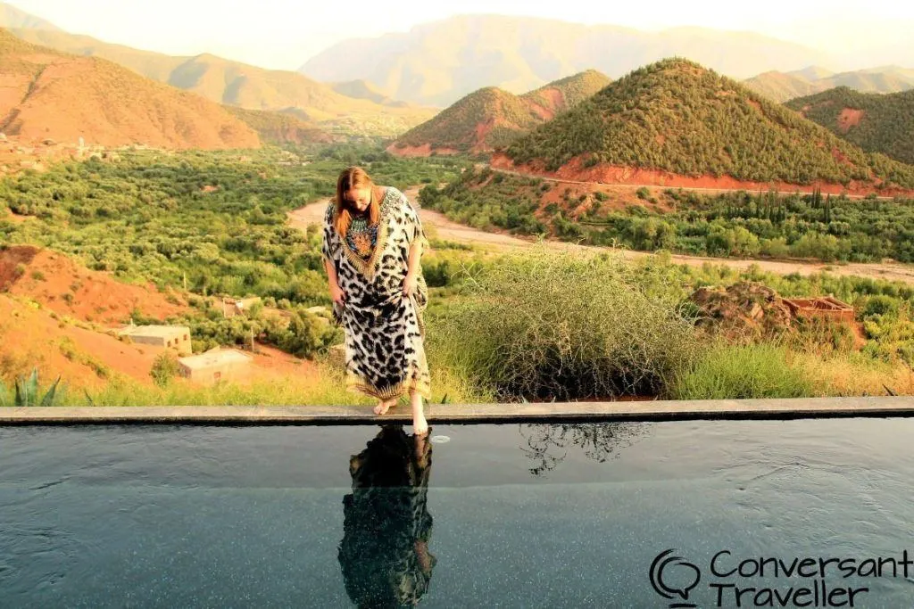 Heather dips a toe into the fabulous infinity pool at the Kasbah Bab Ourika in Morocco.