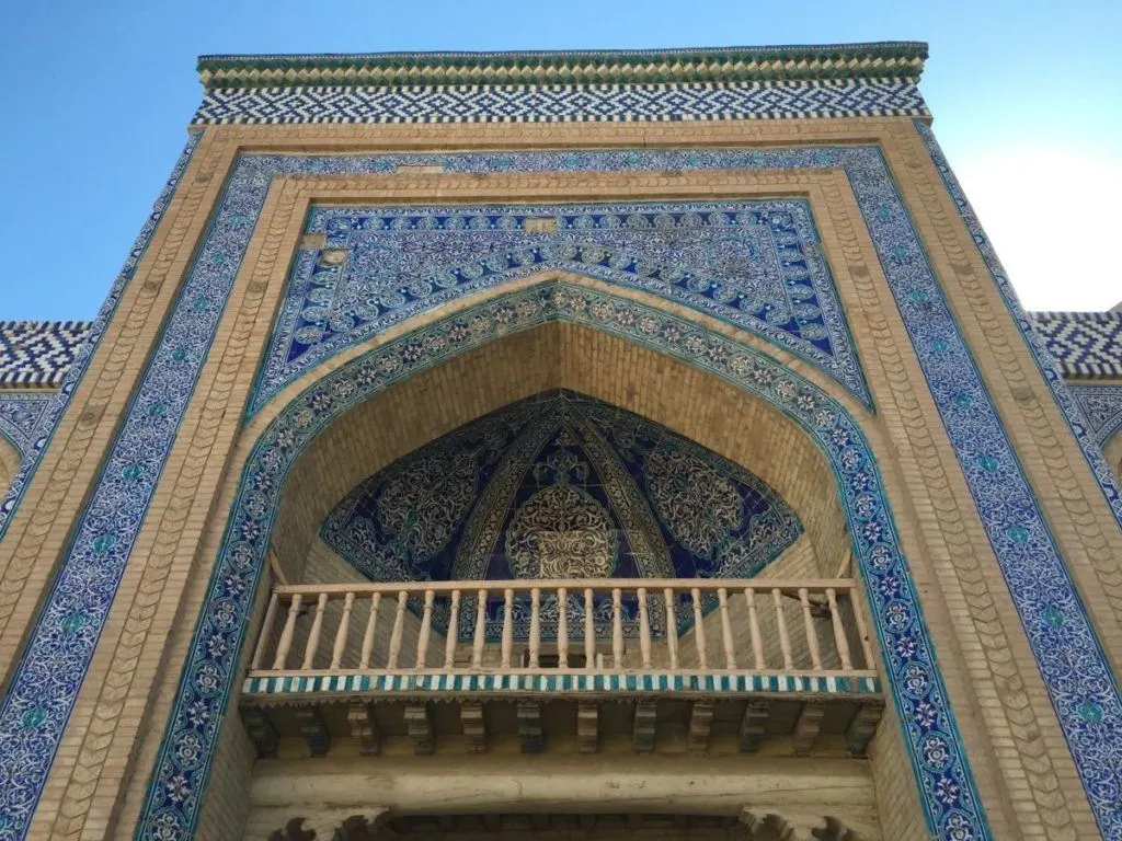 Beuatiful blue tile mosaic on the front of a mosque in Uzbekistan.