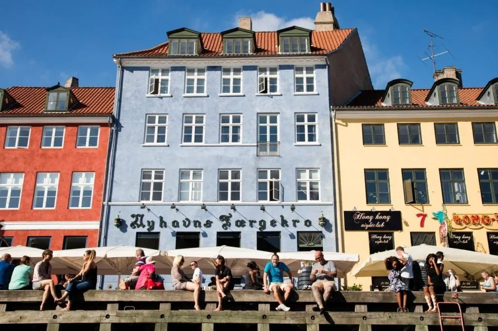 Relax and watch the boats go by, one of the best things to do in Copenhagen on a sunny summer afternoon.