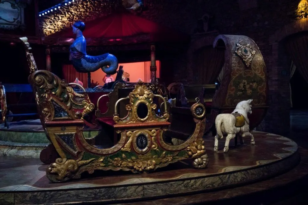 Taking a turn at all the great rides in the carnival arts museum of Paris.