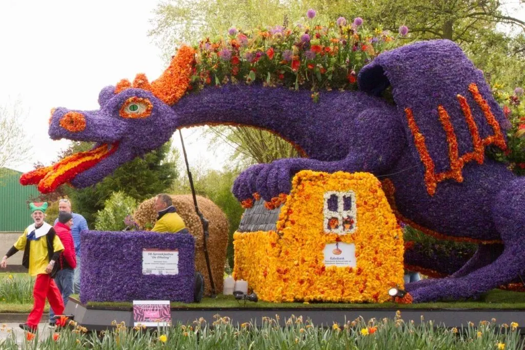 A purple and orange dragon floats by in the Tulip Festival Parade in the Netherlands.