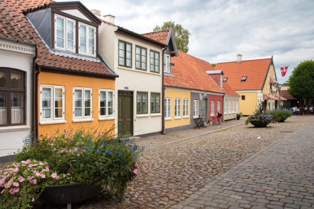 Old houses on cobble stone streets of Odense, Denmark.