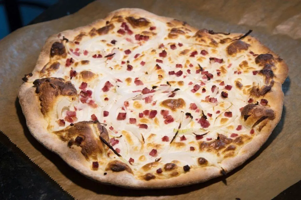 Straight from the oven, a yummy tarte flambee.