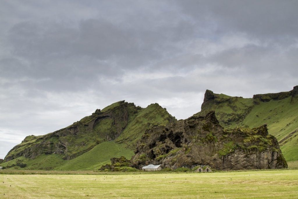 A lonely farm sits amidst the striking geography of Iceland.