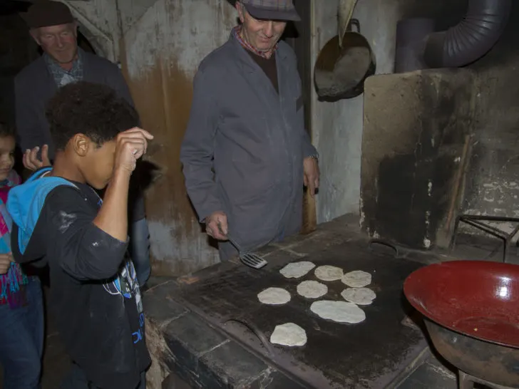 Making bread is one of the many activities kids can do at the Open Air Museums in Germany.