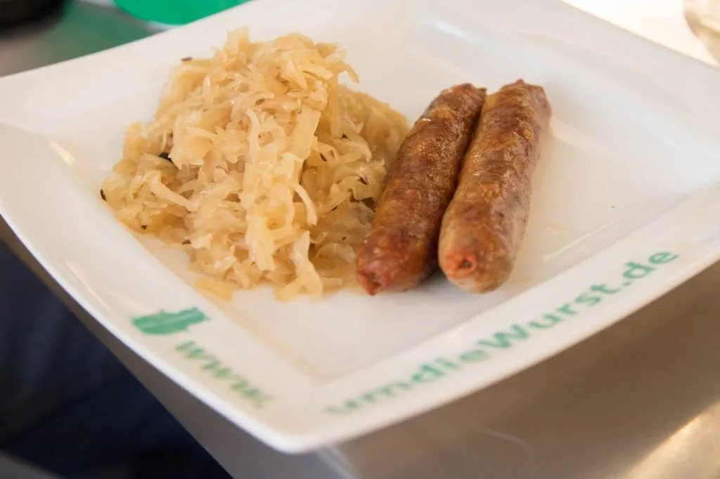 Traditional sauerkraut and German bratwurst.