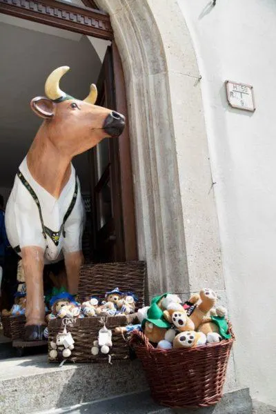 A huge cow and small stuffed animals invited people in to buy Rothenburg souvenirs.