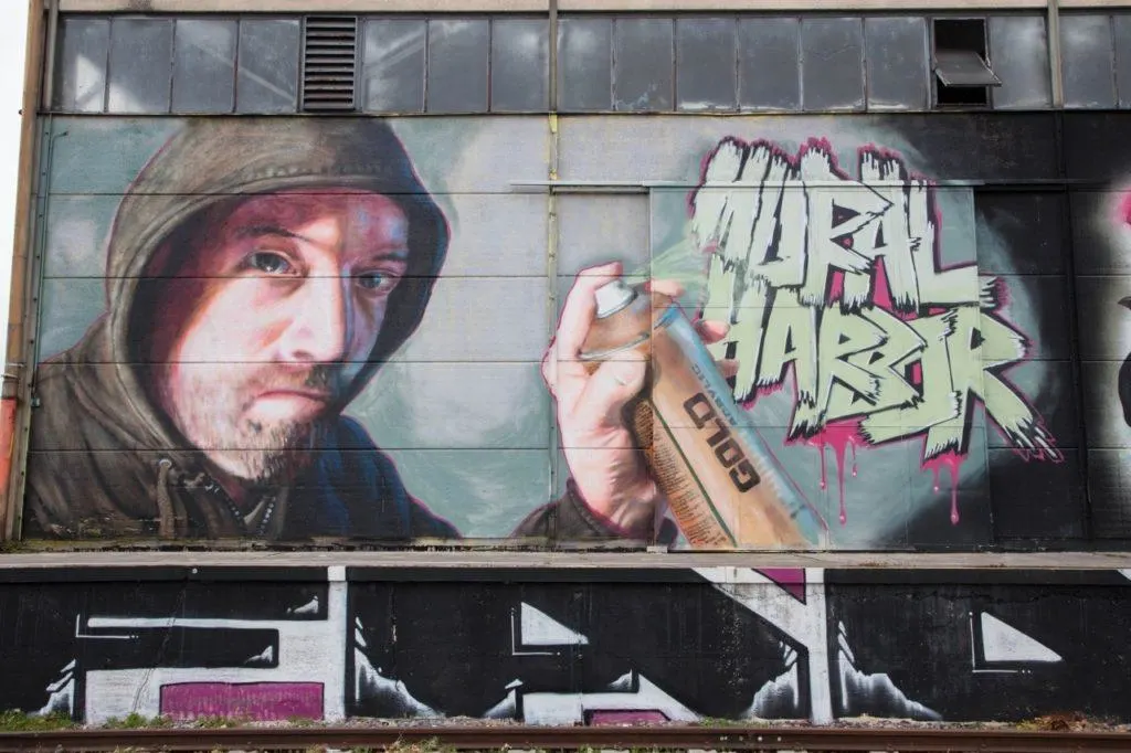 Graffiti artist portrait at Linz Mural Harbor.