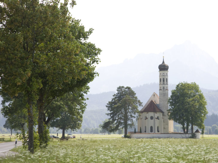 Germany in summer is a wonderful place. Just look at this field of flowers in front of this Bavarian church.