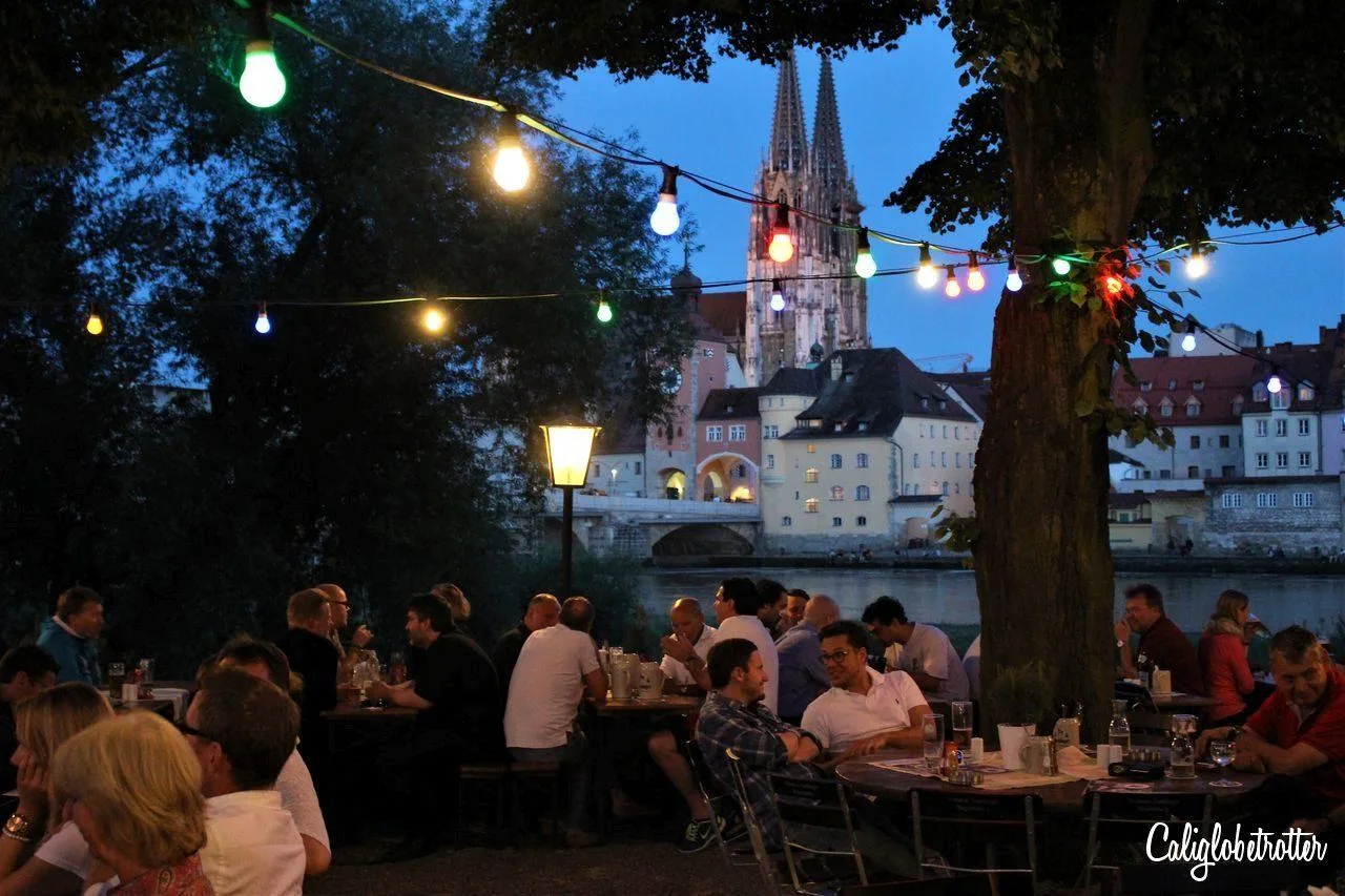 Outdoor cafe on the riverside in Regensburg.