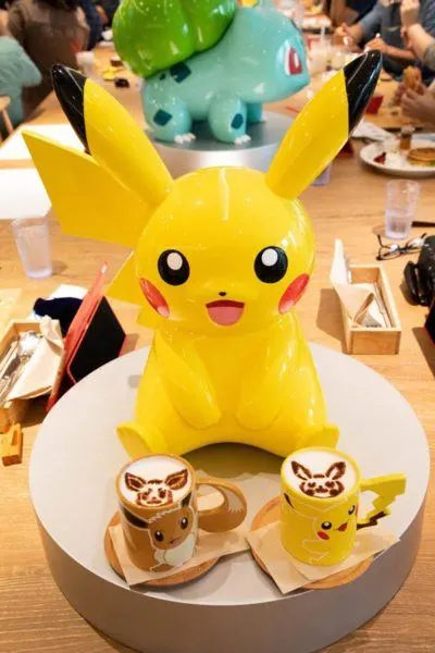 Pikachu, and coffees with Pikachu and Evie on them.