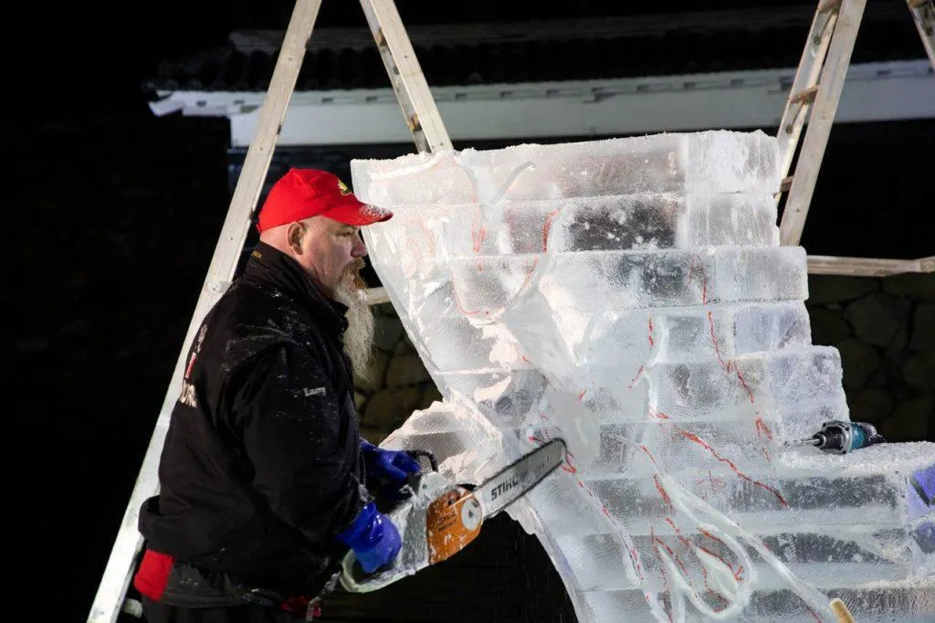 A Canadian team sculpts at the Masumoto Ice Sculpture Festival in Japan.