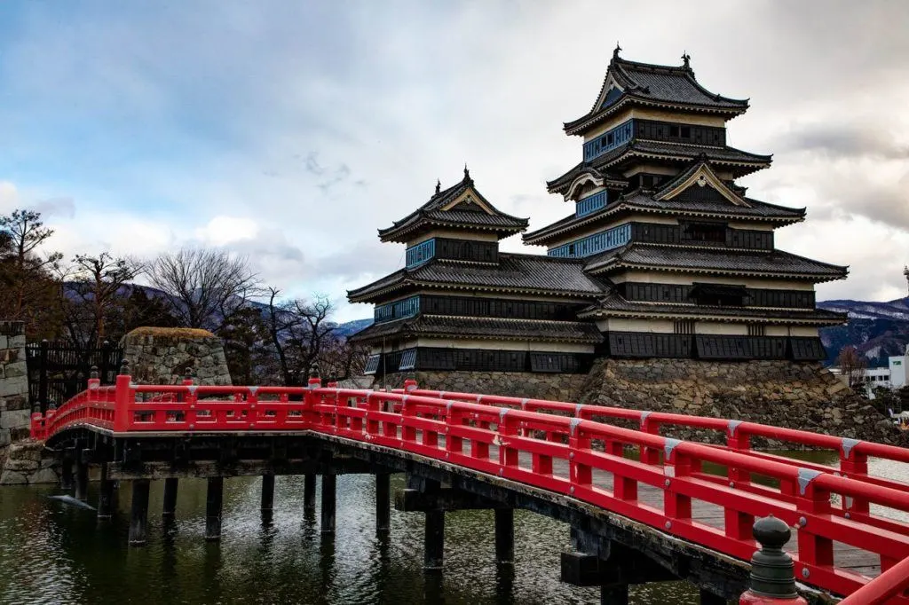 Matsumoto Castle with red bridge - number one thing to do in Matsumoto