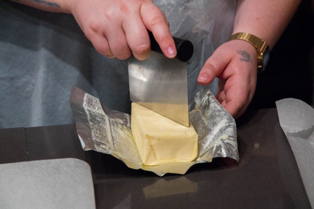 Cutting French butter, 80% fat.