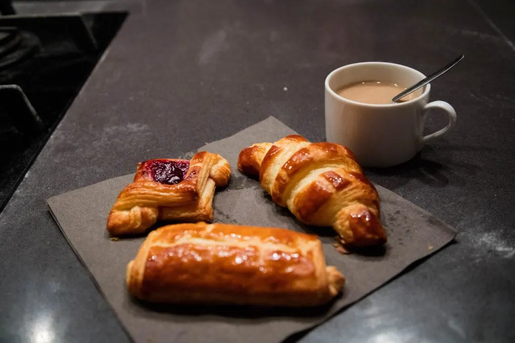A cup of coffee and the pastries we made in our baking class in Paris.